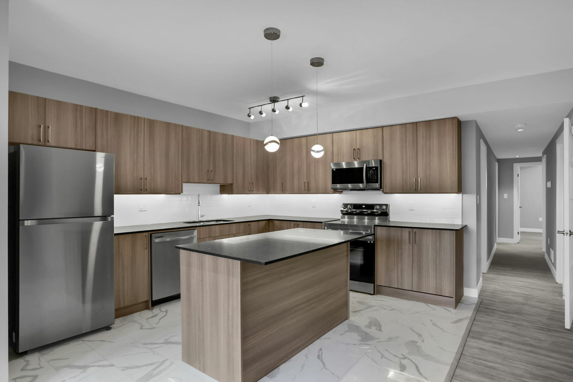 Kitchen cabinetry and island at Masonville 42s